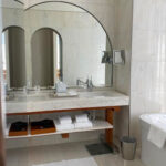 bathroom sink with towels